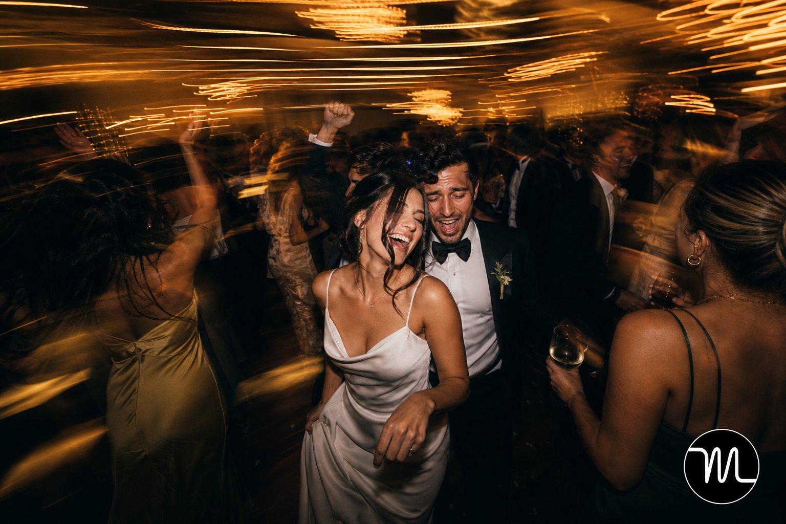Artful motion blur and light trails add a layer of sophisticated energy to reception photos, capturing the authentic 'vibe' of the celebration.